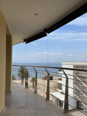 Duplex en primera línea de playa con gran terraza y piscina comunitaria
